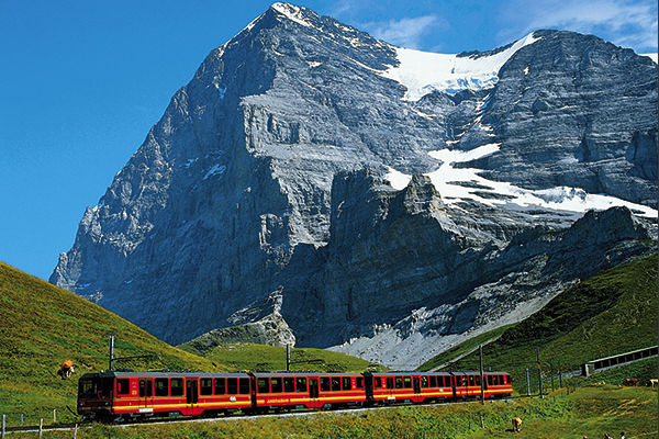 Views of the Jungfrau Railway and train, with Grindelwald scenery. TUI Lakes and Mountains